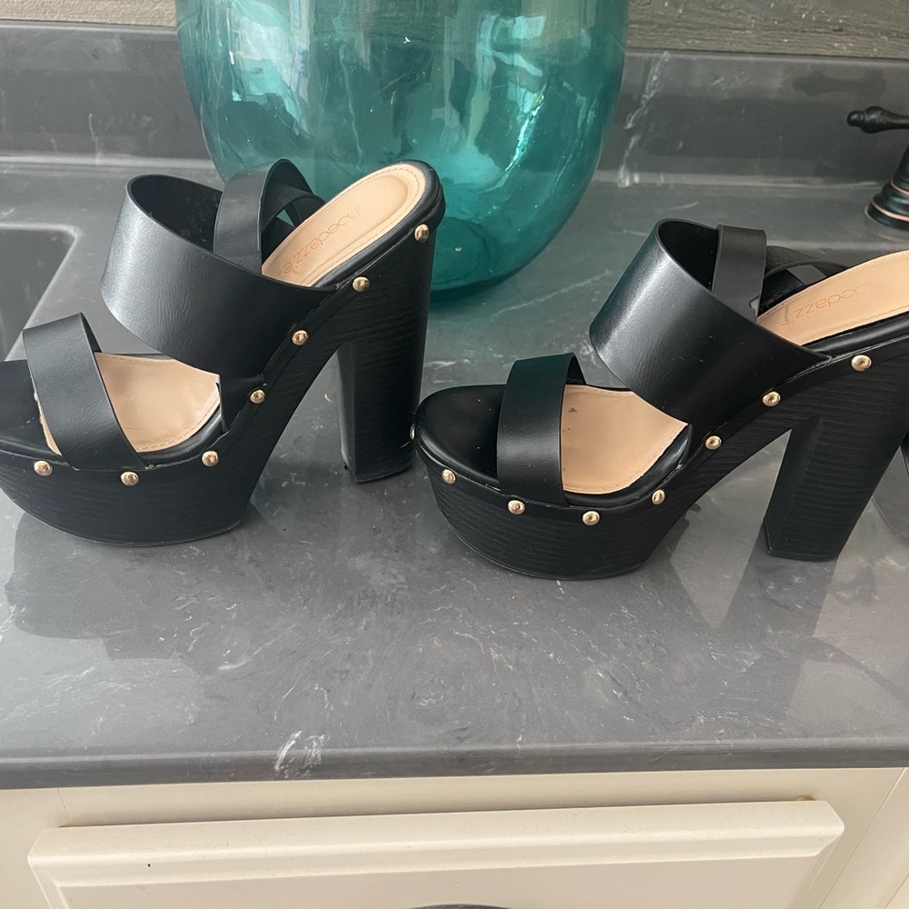 Size 7, black studded platforms